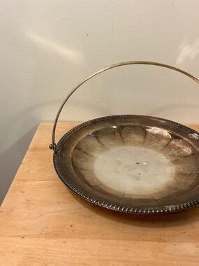 Vintage Silver plated Dish with handle 7.5 inches diameter